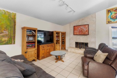 This single family pool home is nestled on a lush and tropical on The Wanderers Club in Florida - for sale on GolfHomes.com, golf home, golf lot