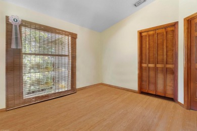This single family pool home is nestled on a lush and tropical on The Wanderers Club in Florida - for sale on GolfHomes.com, golf home, golf lot