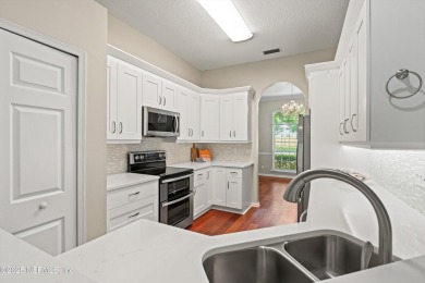 Tucked on a private 1.3-acre lot with no neighbor directly on Jacksonville Beach Golf Course in Florida - for sale on GolfHomes.com, golf home, golf lot
