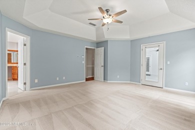 Tucked on a private 1.3-acre lot with no neighbor directly on Jacksonville Beach Golf Course in Florida - for sale on GolfHomes.com, golf home, golf lot