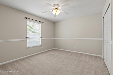 Tucked on a private 1.3-acre lot with no neighbor directly on Jacksonville Beach Golf Course in Florida - for sale on GolfHomes.com, golf home, golf lot