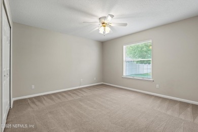 Tucked on a private 1.3-acre lot with no neighbor directly on Jacksonville Beach Golf Course in Florida - for sale on GolfHomes.com, golf home, golf lot