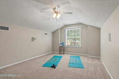 Tucked on a private 1.3-acre lot with no neighbor directly on Jacksonville Beach Golf Course in Florida - for sale on GolfHomes.com, golf home, golf lot
