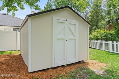 Tucked on a private 1.3-acre lot with no neighbor directly on Jacksonville Beach Golf Course in Florida - for sale on GolfHomes.com, golf home, golf lot