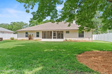 Tucked on a private 1.3-acre lot with no neighbor directly on Jacksonville Beach Golf Course in Florida - for sale on GolfHomes.com, golf home, golf lot