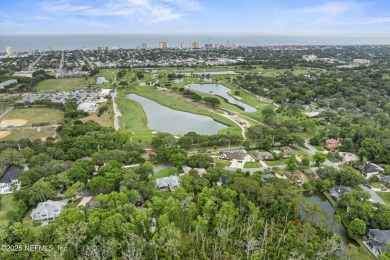 Tucked on a private 1.3-acre lot with no neighbor directly on Jacksonville Beach Golf Course in Florida - for sale on GolfHomes.com, golf home, golf lot
