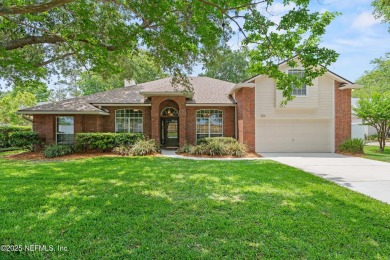 Tucked on a private 1.3-acre lot with no neighbor directly on Jacksonville Beach Golf Course in Florida - for sale on GolfHomes.com, golf home, golf lot