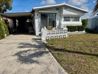 This classic 1958 mobile home is an oldie but a goodie, offering on Heather Hills Golf Course in Florida - for sale on GolfHomes.com, golf home, golf lot