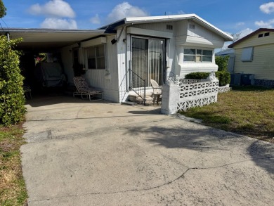 This classic 1958 mobile home is an oldie but a goodie, offering on Heather Hills Golf Course in Florida - for sale on GolfHomes.com, golf home, golf lot