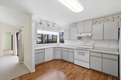 Hurry and grab this spectacular pool home offering over 2,000 on The Grand Club - Pine Lakes Course in Florida - for sale on GolfHomes.com, golf home, golf lot