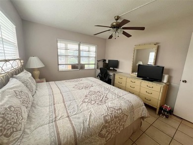 ***CORNER CONDO*** WELL MAINTAINED FIRST FLOOR,  2 BEDROOM, 1.5 on Hillsboro Pines Golf in Florida - for sale on GolfHomes.com, golf home, golf lot