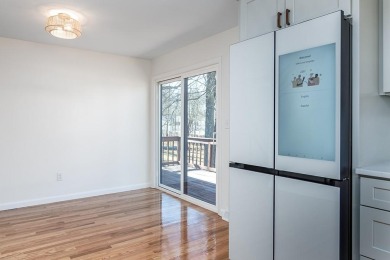 This beautifully renovated home has been completely remodeled to on Warwick Country Club in Rhode Island - for sale on GolfHomes.com, golf home, golf lot