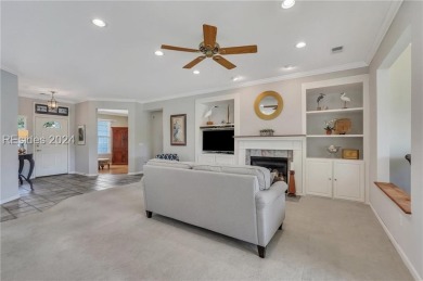 Located in Sun City Hilton Head, this charming Hatteras model on Hidden Cypress Golf Club in South Carolina - for sale on GolfHomes.com, golf home, golf lot