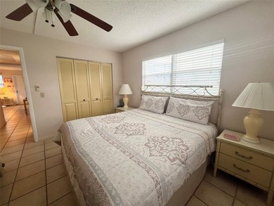 ***CORNER CONDO*** WELL MAINTAINED FIRST FLOOR,  2 BEDROOM, 1.5 on Hillsboro Pines Golf in Florida - for sale on GolfHomes.com, golf home, golf lot