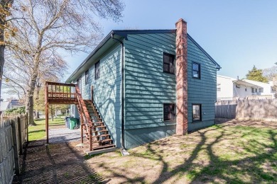 This beautifully renovated home has been completely remodeled to on Warwick Country Club in Rhode Island - for sale on GolfHomes.com, golf home, golf lot