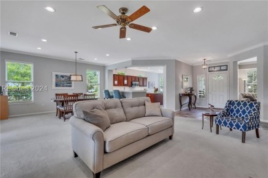 Located in Sun City Hilton Head, this charming Hatteras model on Hidden Cypress Golf Club in South Carolina - for sale on GolfHomes.com, golf home, golf lot