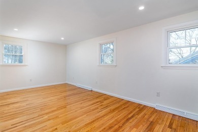 This beautifully renovated home has been completely remodeled to on Warwick Country Club in Rhode Island - for sale on GolfHomes.com, golf home, golf lot