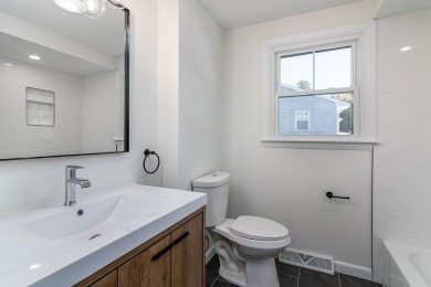 This beautifully renovated home has been completely remodeled to on Warwick Country Club in Rhode Island - for sale on GolfHomes.com, golf home, golf lot