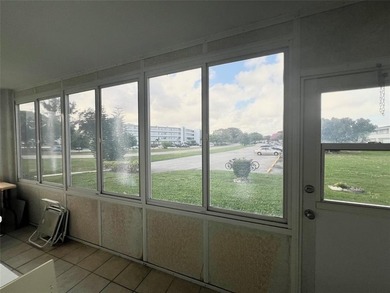 ***CORNER CONDO*** WELL MAINTAINED FIRST FLOOR,  2 BEDROOM, 1.5 on Hillsboro Pines Golf in Florida - for sale on GolfHomes.com, golf home, golf lot