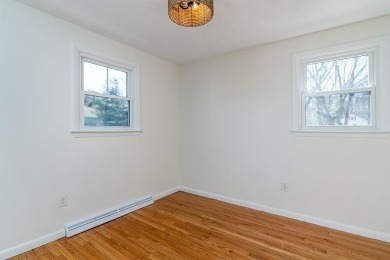 This beautifully renovated home has been completely remodeled to on Warwick Country Club in Rhode Island - for sale on GolfHomes.com, golf home, golf lot