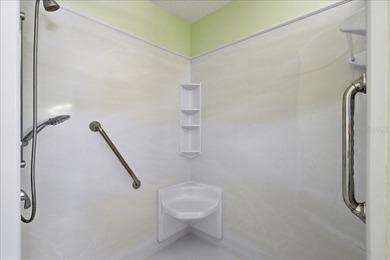 Hurry and grab this spectacular pool home offering over 2,000 on The Grand Club - Pine Lakes Course in Florida - for sale on GolfHomes.com, golf home, golf lot