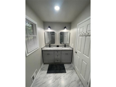 Discover a rare gem in the sought-after Pine Ridge Country Club on Collins Hill Golf Club in Georgia - for sale on GolfHomes.com, golf home, golf lot