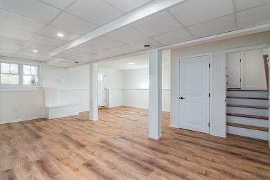 This beautifully renovated home has been completely remodeled to on Warwick Country Club in Rhode Island - for sale on GolfHomes.com, golf home, golf lot
