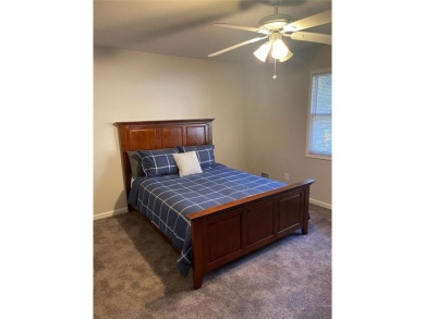 Discover a rare gem in the sought-after Pine Ridge Country Club on Collins Hill Golf Club in Georgia - for sale on GolfHomes.com, golf home, golf lot
