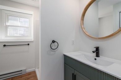 This beautifully renovated home has been completely remodeled to on Warwick Country Club in Rhode Island - for sale on GolfHomes.com, golf home, golf lot