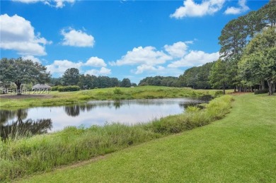 Located in Sun City Hilton Head, this charming Hatteras model on Hidden Cypress Golf Club in South Carolina - for sale on GolfHomes.com, golf home, golf lot