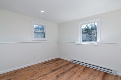 This beautifully renovated home has been completely remodeled to on Warwick Country Club in Rhode Island - for sale on GolfHomes.com, golf home, golf lot