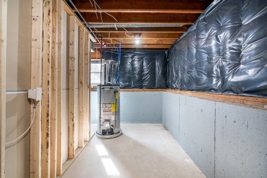 This beautifully renovated home has been completely remodeled to on Warwick Country Club in Rhode Island - for sale on GolfHomes.com, golf home, golf lot