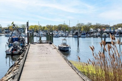 This beautifully renovated home has been completely remodeled to on Warwick Country Club in Rhode Island - for sale on GolfHomes.com, golf home, golf lot