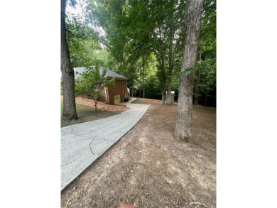 Discover a rare gem in the sought-after Pine Ridge Country Club on Collins Hill Golf Club in Georgia - for sale on GolfHomes.com, golf home, golf lot