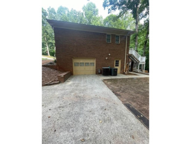 Discover a rare gem in the sought-after Pine Ridge Country Club on Collins Hill Golf Club in Georgia - for sale on GolfHomes.com, golf home, golf lot