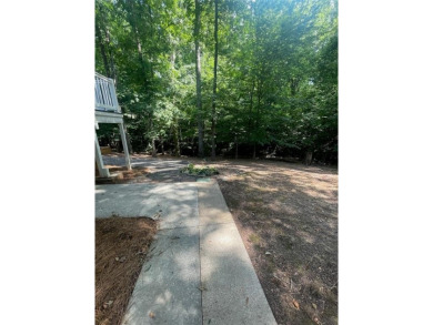 Discover a rare gem in the sought-after Pine Ridge Country Club on Collins Hill Golf Club in Georgia - for sale on GolfHomes.com, golf home, golf lot