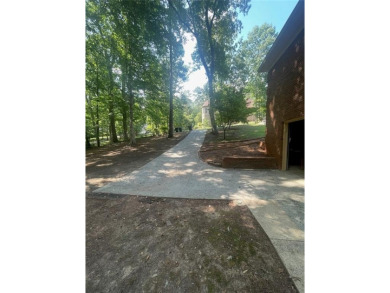 Discover a rare gem in the sought-after Pine Ridge Country Club on Collins Hill Golf Club in Georgia - for sale on GolfHomes.com, golf home, golf lot