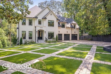 Situated on a private lot framed by a canopy of mature trees on Cross Creek Golf Course in Georgia - for sale on GolfHomes.com, golf home, golf lot