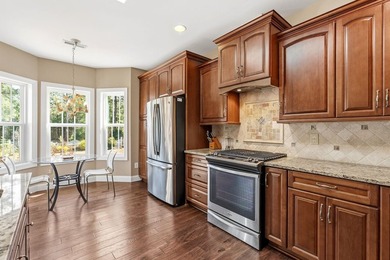 As you arrive to this custom built home, you're greeted by lush on Brunswick Plantation and Golf Resorts in North Carolina - for sale on GolfHomes.com, golf home, golf lot