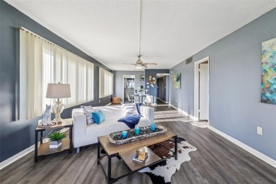 Stunning golf course and pond views from a light-filled corner on Seminole Lake Country Club in Florida - for sale on GolfHomes.com, golf home, golf lot