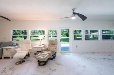 This meticulously maintained home sits on an oversized, nicely on Riviera Golf Club in Florida - for sale on GolfHomes.com, golf home, golf lot