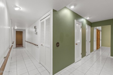 Location, location! This charming 3-bedroom, 2.5-bath home in on PalmBrook Country Club in Arizona - for sale on GolfHomes.com, golf home, golf lot