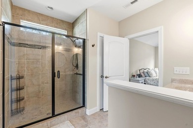 As you arrive to this custom built home, you're greeted by lush on Brunswick Plantation and Golf Resorts in North Carolina - for sale on GolfHomes.com, golf home, golf lot