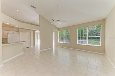 One or more photo(s) has been virtually staged. DARLING HOME! on IMG Academies Golf and Country Club in Florida - for sale on GolfHomes.com, golf home, golf lot