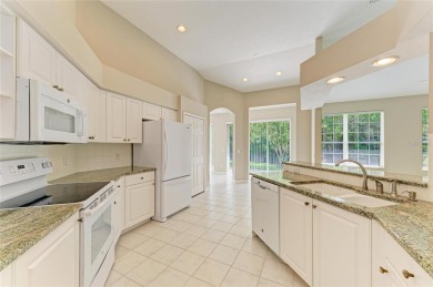One or more photo(s) has been virtually staged. DARLING HOME! on IMG Academies Golf and Country Club in Florida - for sale on GolfHomes.com, golf home, golf lot