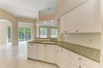 One or more photo(s) has been virtually staged. DARLING HOME! on IMG Academies Golf and Country Club in Florida - for sale on GolfHomes.com, golf home, golf lot