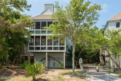 Just steps away from the beautiful Bald Head Island marsh is on Bald Head Island Golf Club in North Carolina - for sale on GolfHomes.com, golf home, golf lot