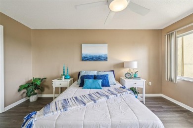 Stunning golf course and pond views from a light-filled corner on Seminole Lake Country Club in Florida - for sale on GolfHomes.com, golf home, golf lot