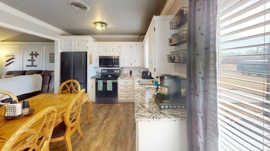 Charming, updated, and in a fantastic location! This home offers on Andrews County Golf Course in Texas - for sale on GolfHomes.com, golf home, golf lot