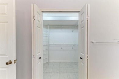One or more photo(s) has been virtually staged. DARLING HOME! on IMG Academies Golf and Country Club in Florida - for sale on GolfHomes.com, golf home, golf lot